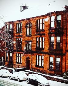 Snowy winter block of flats